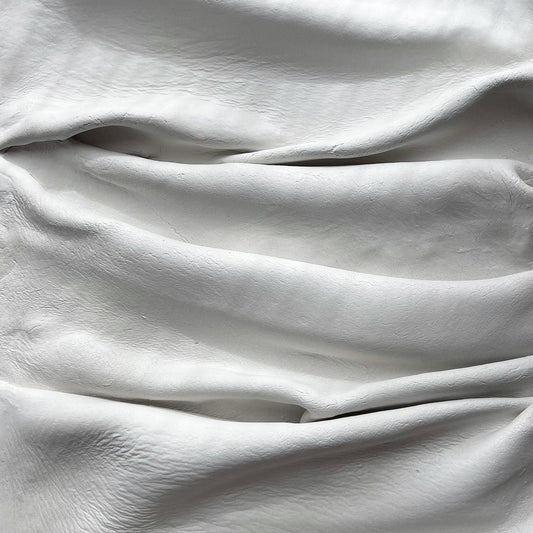White heavyweight fabric with soft folds